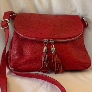 Lavorazione Artigianale red tooled leather crossbody bag/purse